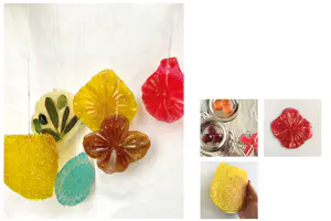 This gift was created to highlight different points in the social spaces on the high street. Aspects that we can improve on and celebrate. One point found was to incorporate more green spaces to improve health and wellbeing. The other to celebrate the textures and embossings in Dudley’s early ironworking. These ornaments were created by melting sweets and printing patterns onto them. - 0_bLySD-pGcd7BOWUv.png