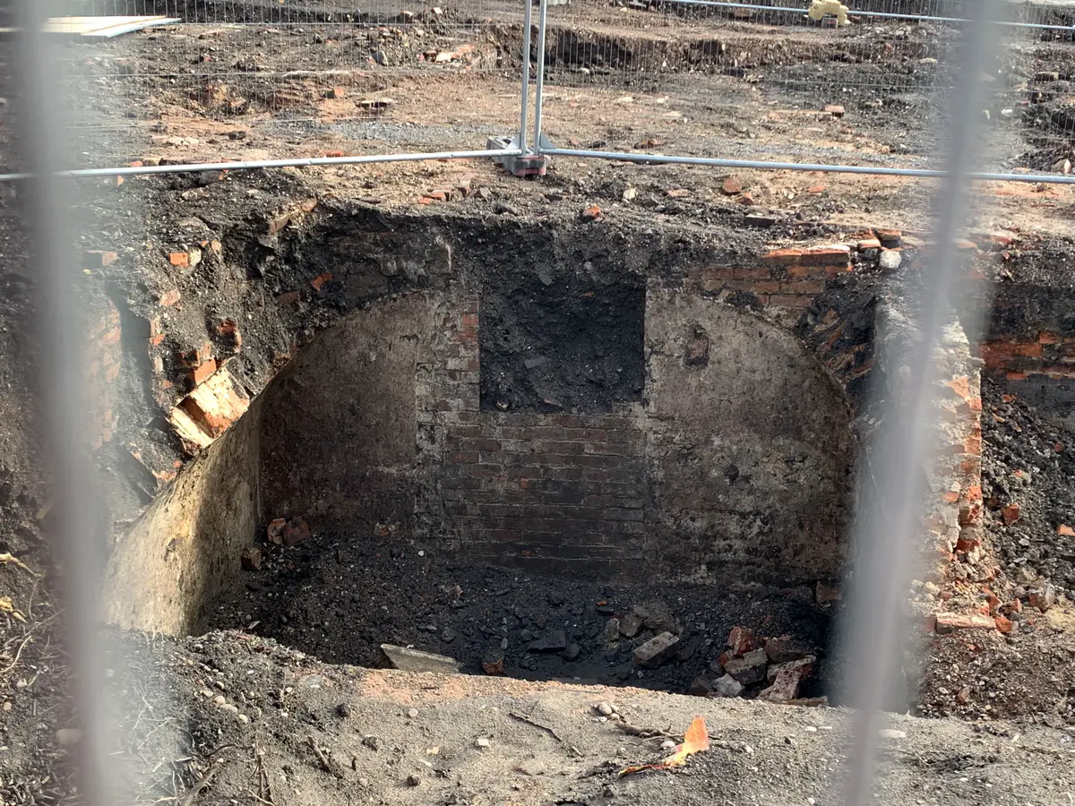 Here are a few pics from some Archeology taking place adjacent to Flood Street. Sadly the fencing wouldn't allow me closer to take better pictures. The excavations show the evidence of former back to back housing, floor tiling laid directly onto the earth, street or yard cobblestones, a coal hole/cellar and possibly a garden path? Then there's a mysterious line of embossed bricks. Tho' not to be seen there'd have been outside WC's.  All rather romantic as the past is often portrayed but such housing tended to create insanitary conditions with rising damp, open indoor fires & lack of ventilation.  - IMG_3699.jpg